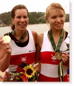 GAN16:SPORT-OLYMPICS:LAKE LANIER,GAINESVILLE,GEORGIA,27,JUL96 - Canada's Marnie McBean (L) and Kathleen Heddle (R) show off their Gold Medals they won in the Womens Double Skulls Final at Lake Lanier during the 1996 Olympics. nd/DIGITAL/Photo by Nick Didlick REUTERS